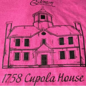 Pink shirt with 1758 Cupola House drawing.